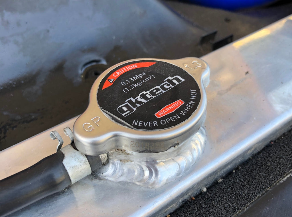 thumbnail image 2 of JDM Black 1.3 Kg/cm² High Pressure Racing Radiator Cap – For Nissan Infiniti 2 of 4